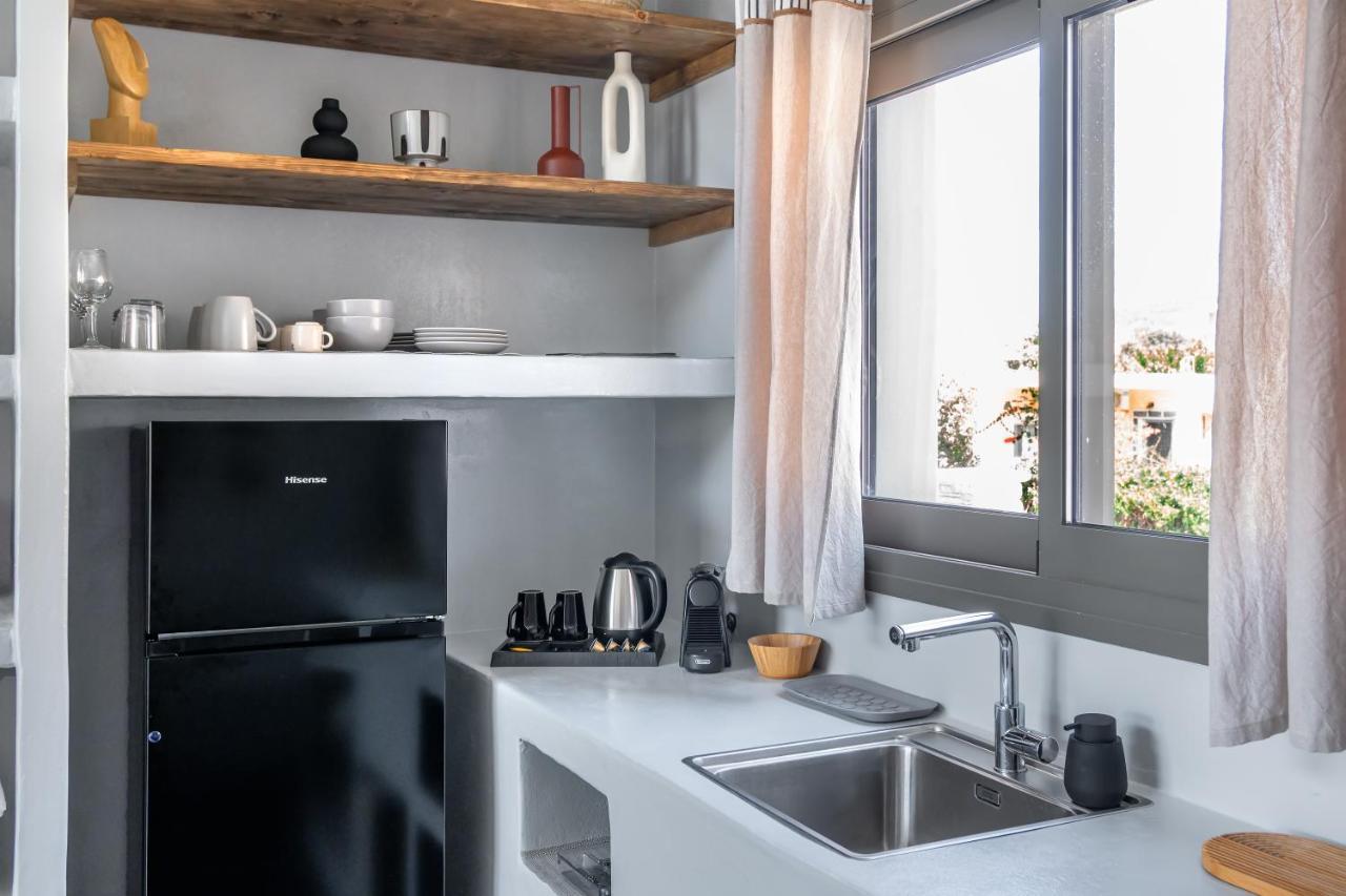 La Perla Suites Agioi Apostoli Extérieur photo