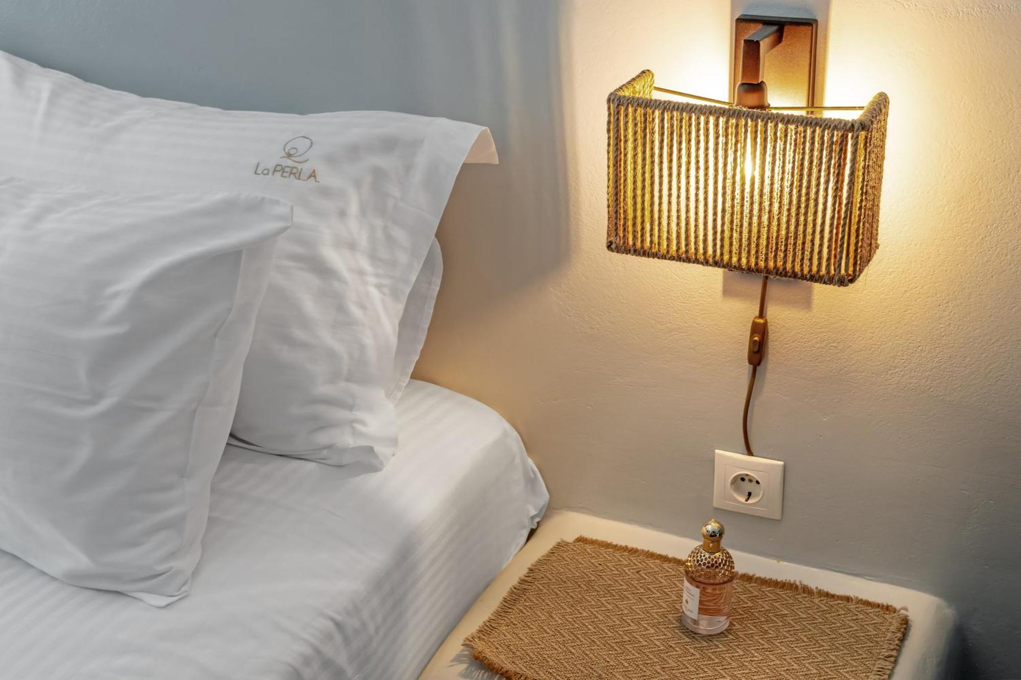 La Perla Suites Agioi Apostoli Extérieur photo
