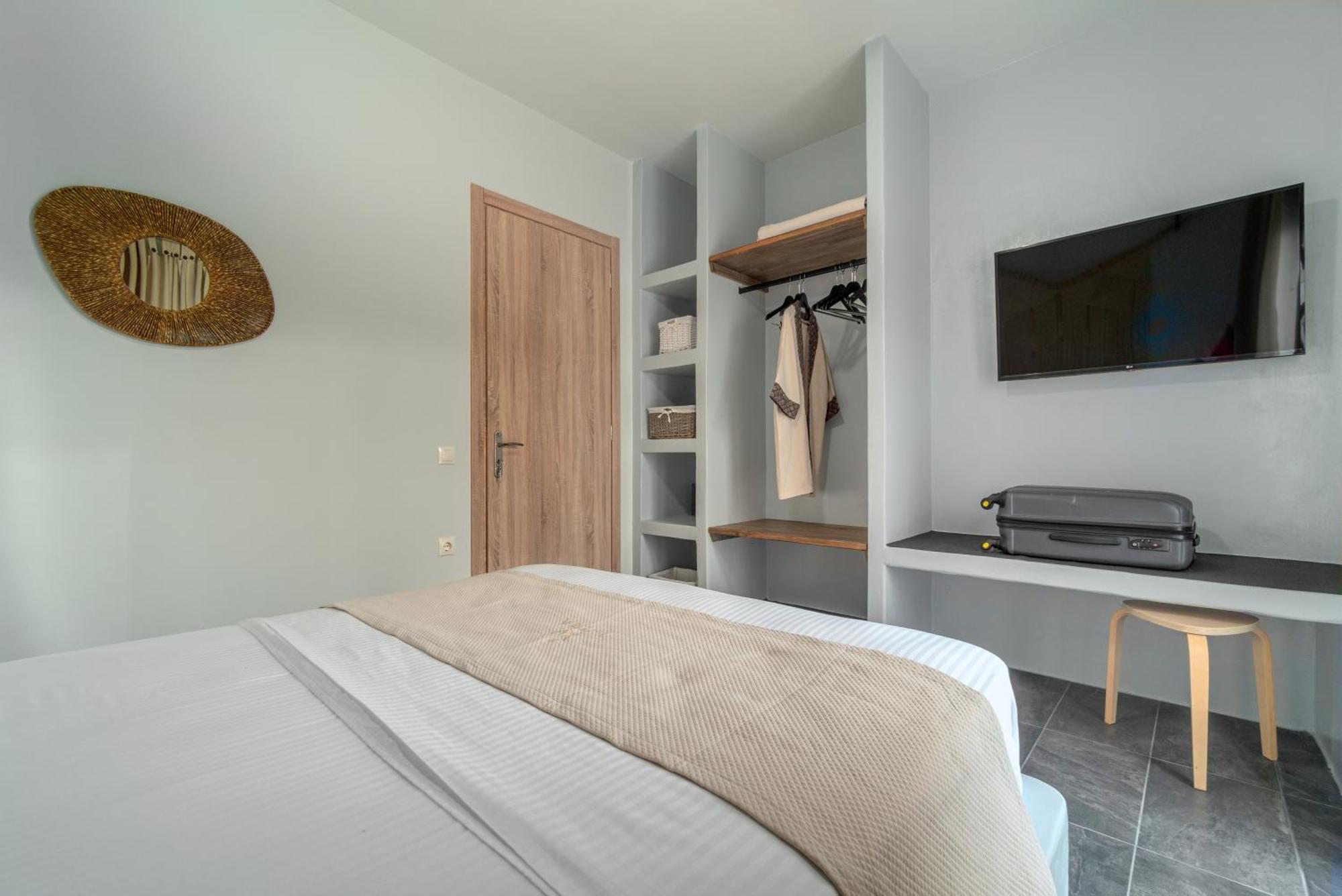 La Perla Suites Agioi Apostoli Extérieur photo