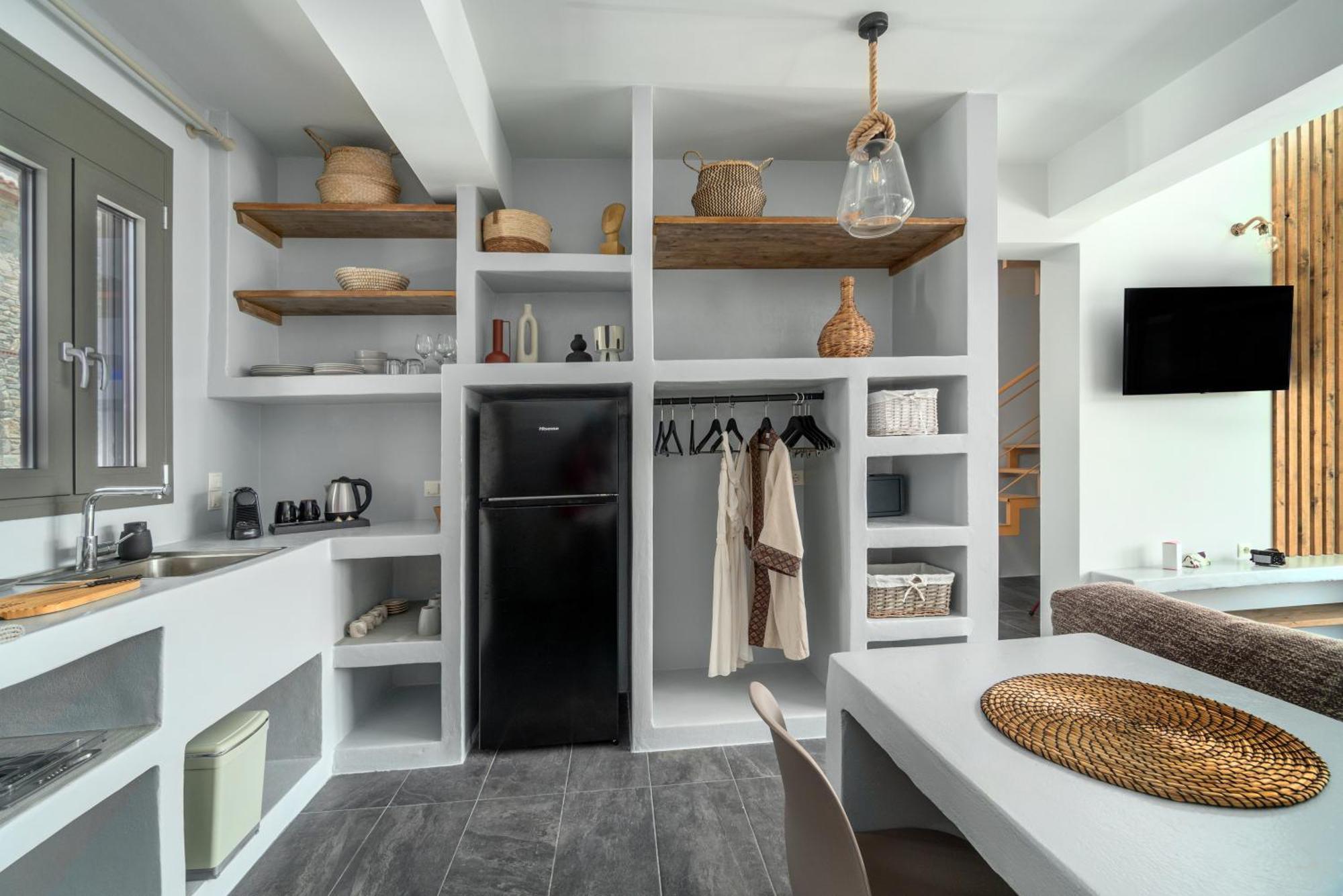 La Perla Suites Agioi Apostoli Extérieur photo