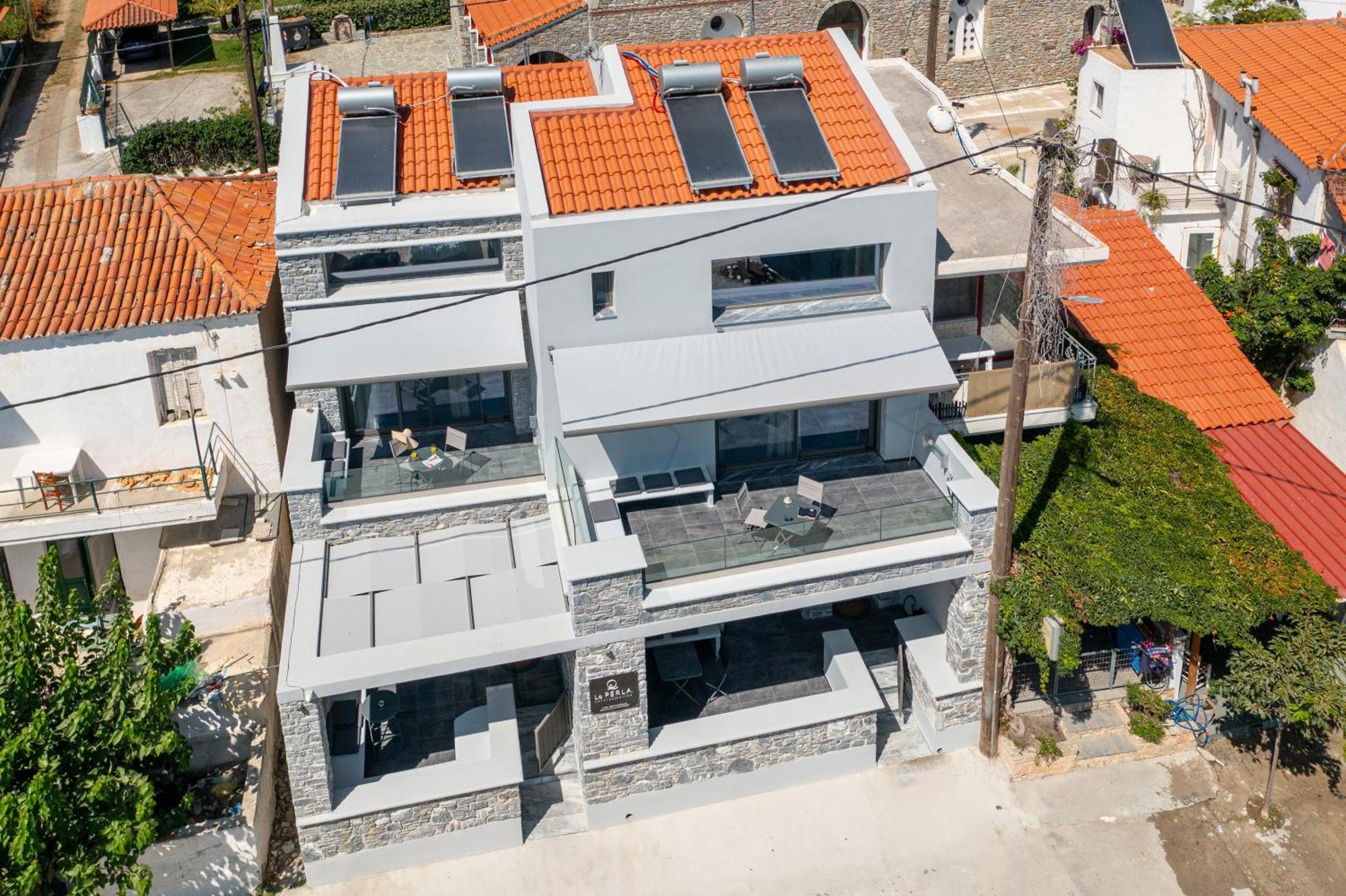 La Perla Suites Agioi Apostoli Extérieur photo